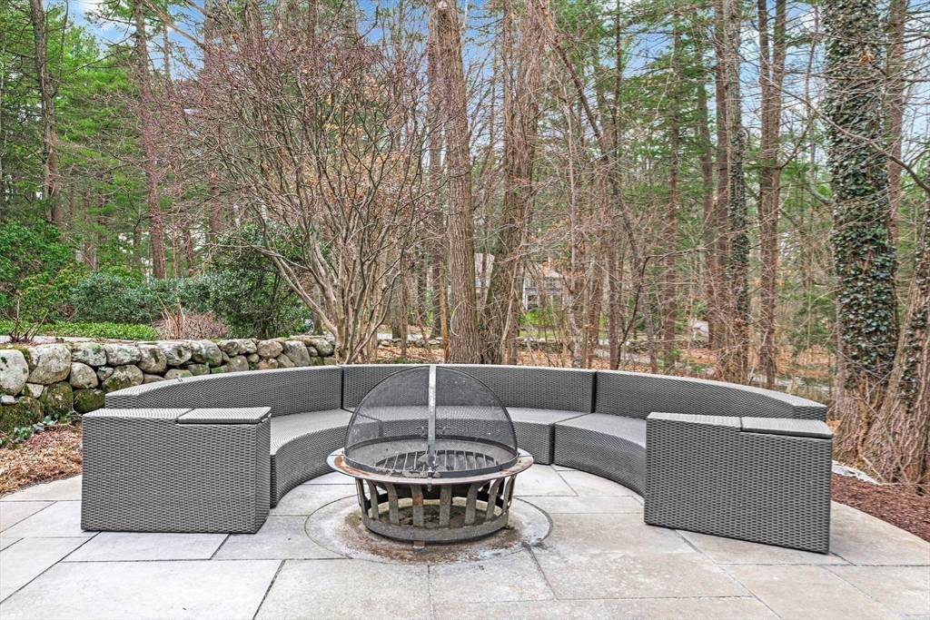 22 Chadwick Road Weston, MA 02493 - Photo 29 of 33 a view of a couches with fire pit