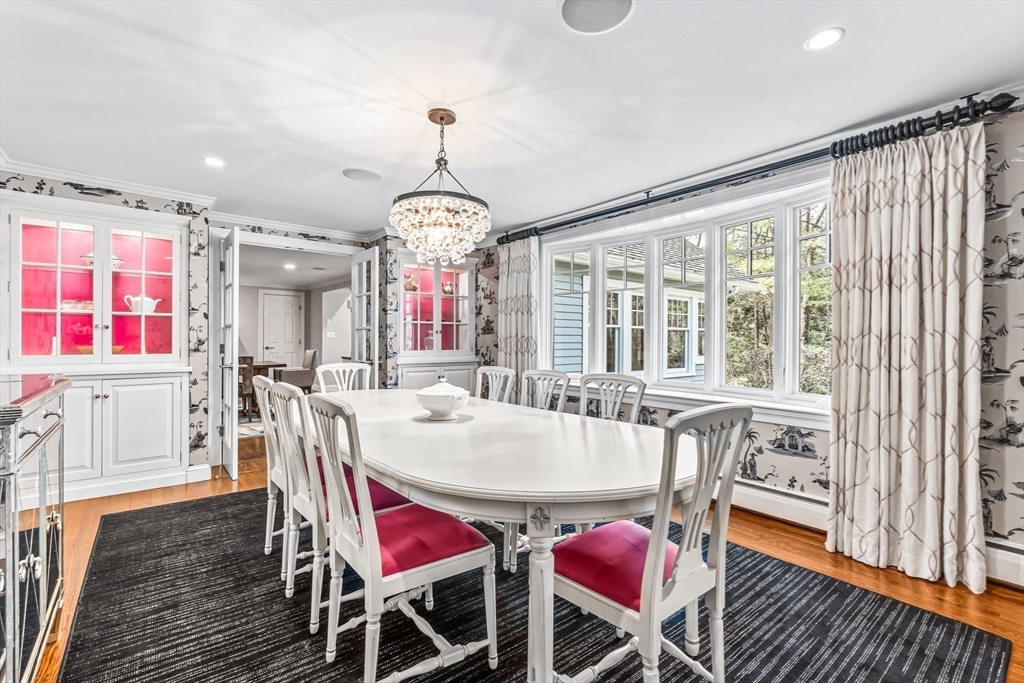 22 Chadwick Road Weston, MA 02493 - Photo 4 of 33 a view of a dining room with furniture window and wooden floor
