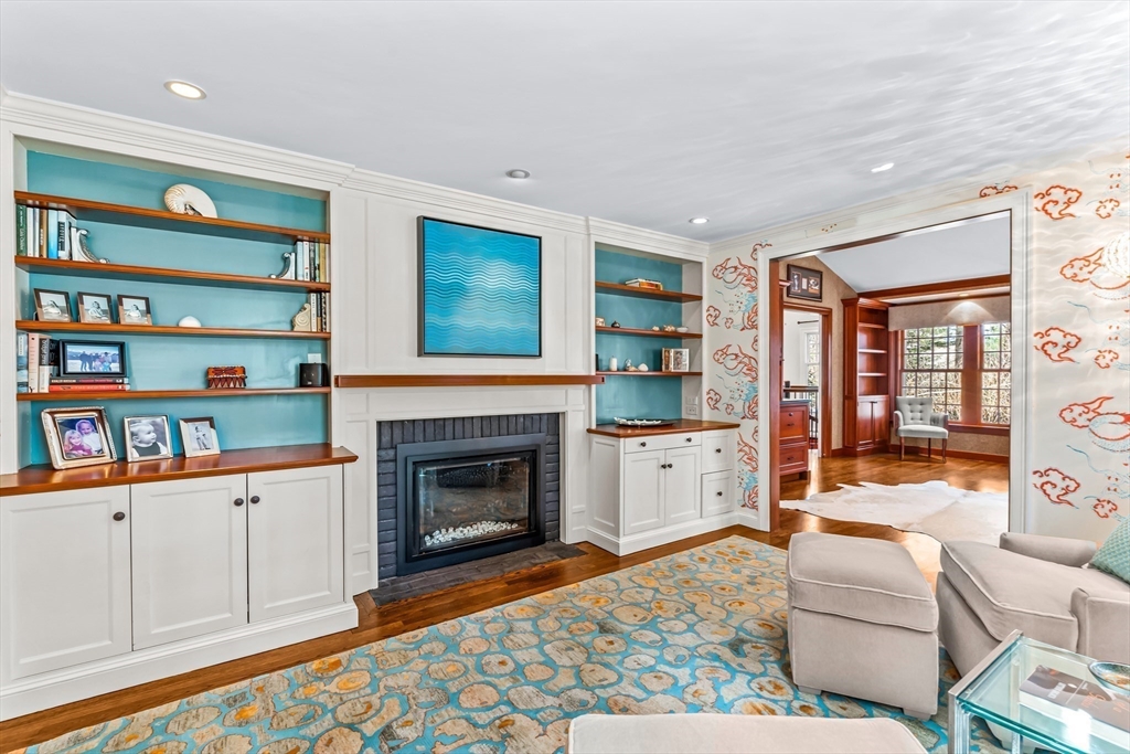 22 Chadwick Road Weston, MA 02493 - Photo 5 of 33 a living room with furniture and a fireplace