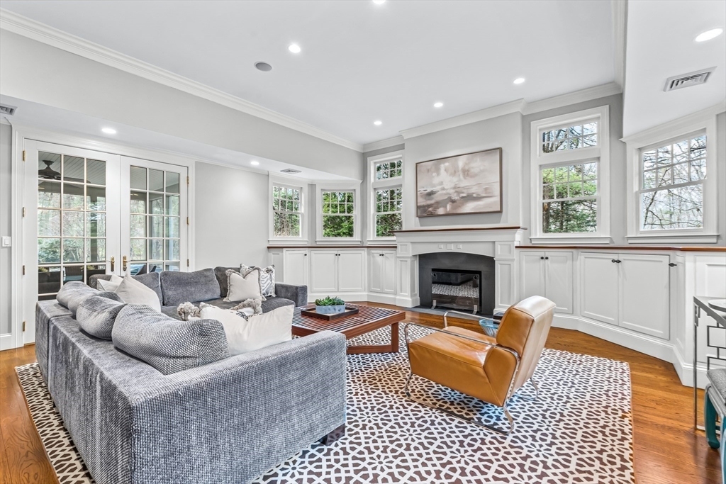 22 Chadwick Road Weston, MA 02493 - Photo 10 of 33 a living room with furniture and a fireplace