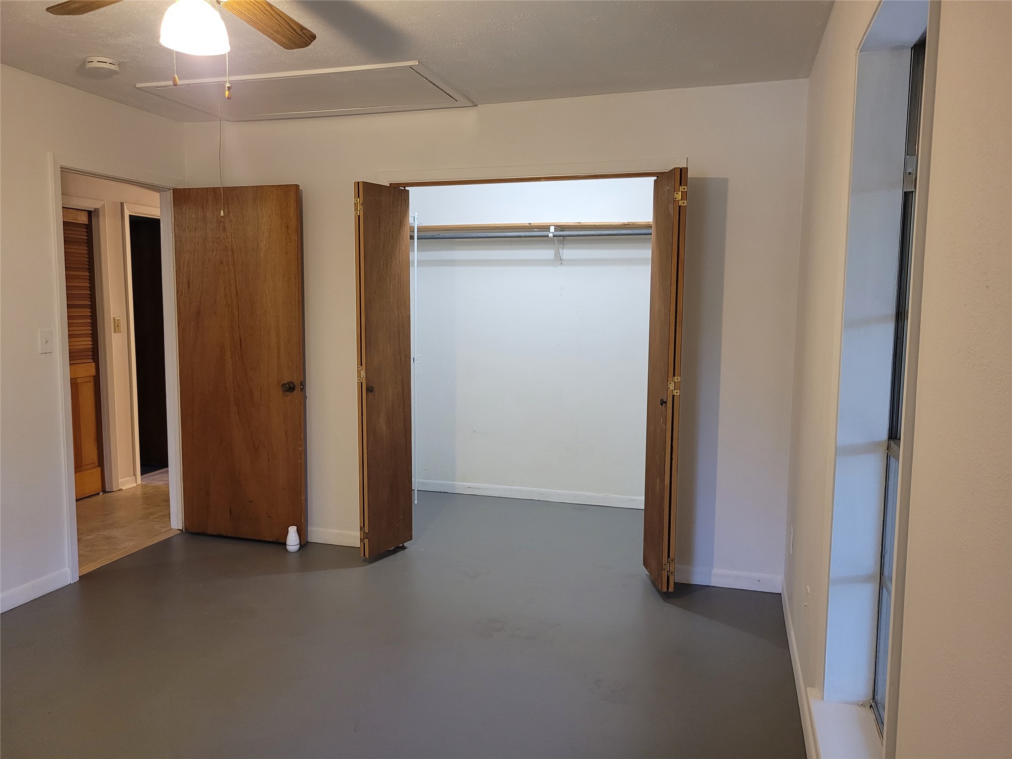 16 Connor Lane Huntsville, TX 77320 - Photo 16 of 33 Primary bedroom looking into the primary closet.