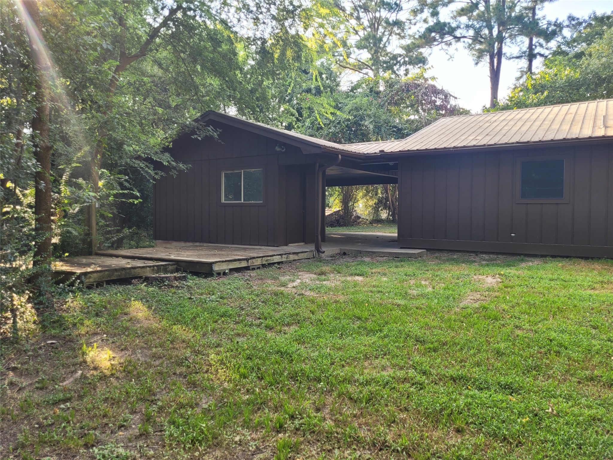 16 Connor Lane Huntsville, TX 77320 - Photo 23 of 33 Backyard area
