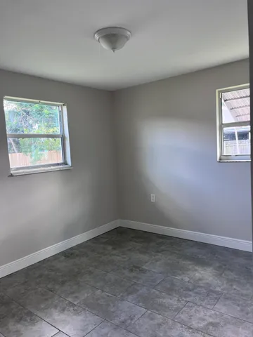 an empty room with windows