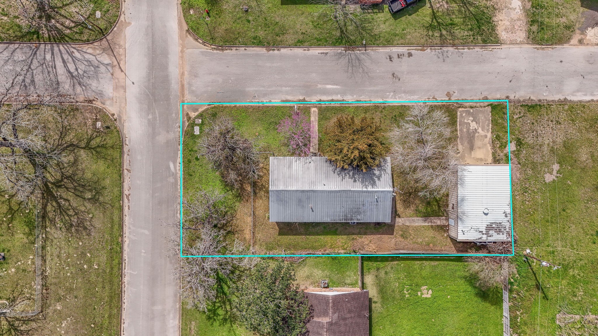 1310 Brazos Street Hempstead, TX 77445 - Photo 31 of 32 front view of a house with a yard