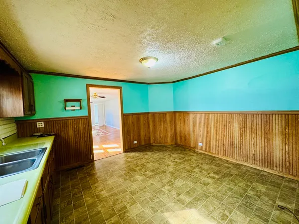 a view of a kitchen with a sink
