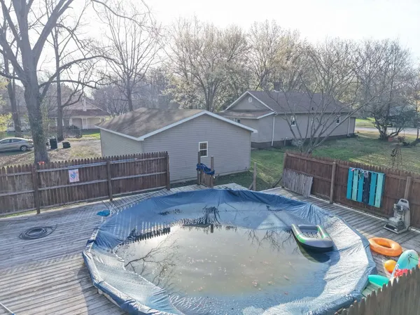 a house view with a backyard space
