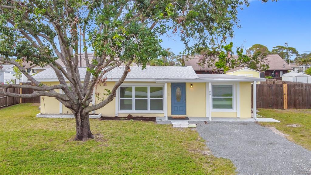 1050 Olympia Road Venice, FL 34293 - Photo 1 of 1 front view of a house with a yard
