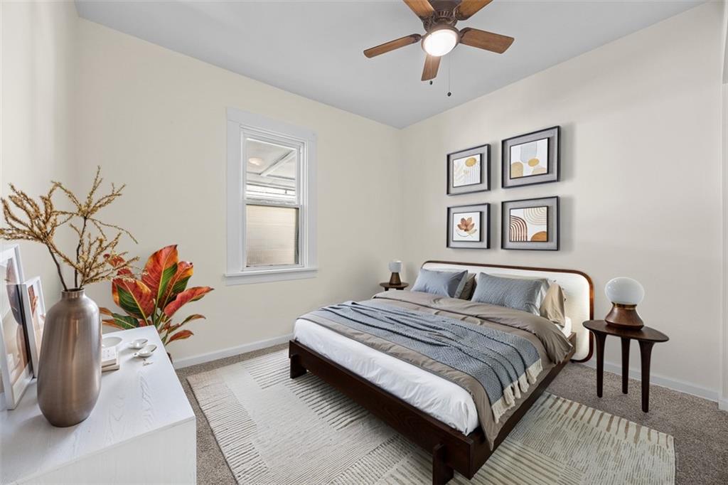 1700 Beaver Road Ambridge, PA 15003 - Photo 18 of 43 a bedroom with a bed and a painting on the wall