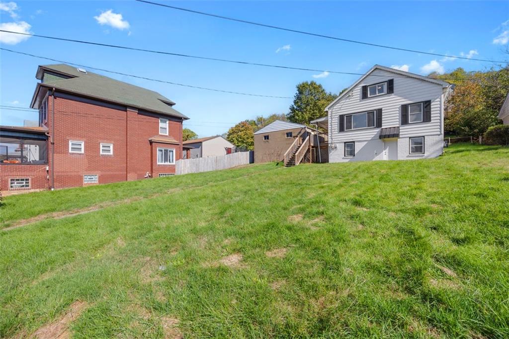 1700 Beaver Road Ambridge, PA 15003 - Photo 34 of 43 a front view of a house with a garden