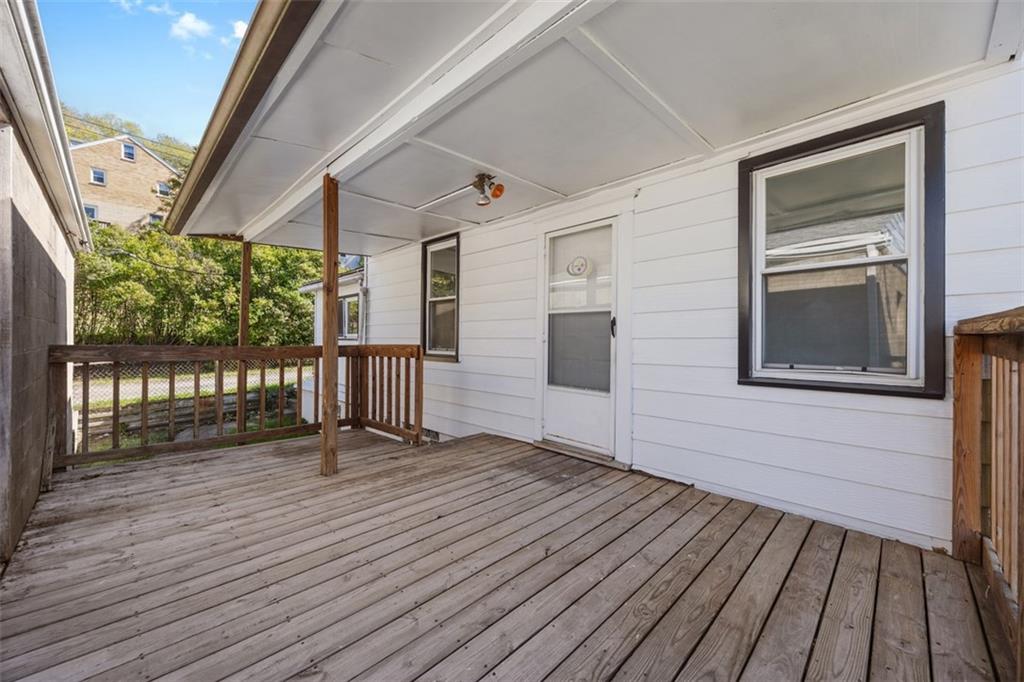 1700 Beaver Road Ambridge, PA 15003 - Photo 5 of 43 a view of front door deck and furniture