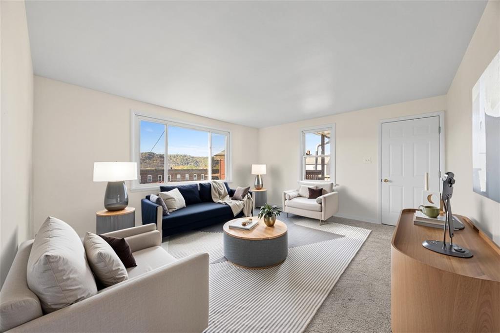 1700 Beaver Road Ambridge, PA 15003 - Photo 6 of 43 a living room with furniture and a couch