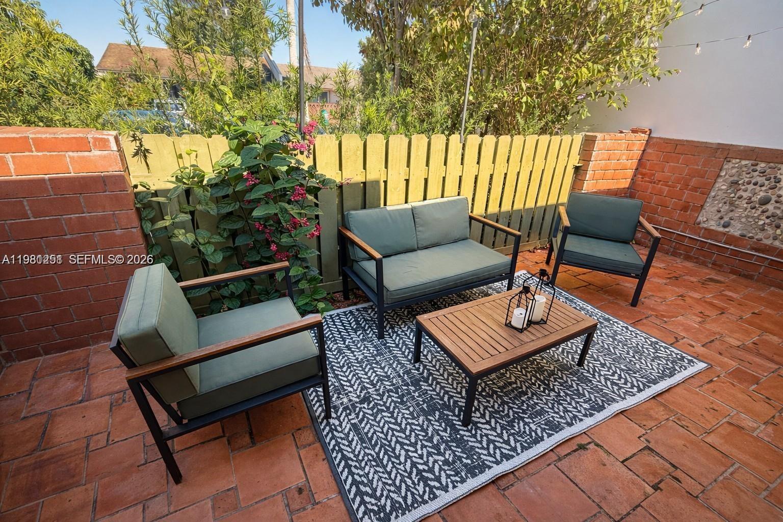 12504 Southwest 112th Terrace Miami, FL 33186 - Photo 11 of 12 swimming outdoor sitting area with a couch