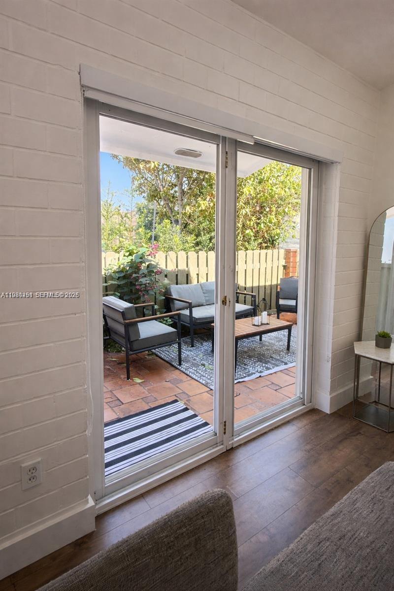 12504 Southwest 112th Terrace Miami, FL 33186 - Photo 4 of 12 a view of entryway and hall with wooden floor