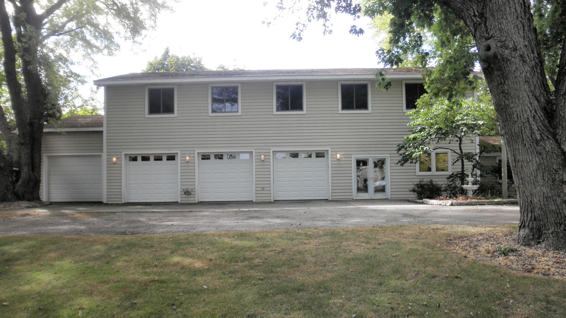 808 Tuxedo Lane Cary, IL 60013 - Photo 19 of 28 a view of a house with a yard