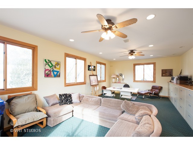 808 Tuxedo Lane Cary, IL 60013 - Photo 21 of 28 a living room with furniture and a large window