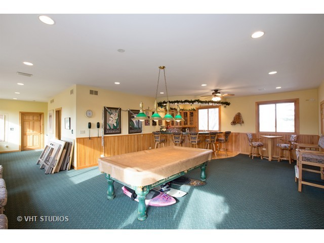 808 Tuxedo Lane Cary, IL 60013 - Photo 22 of 28 a living room with furniture pool table and chairs