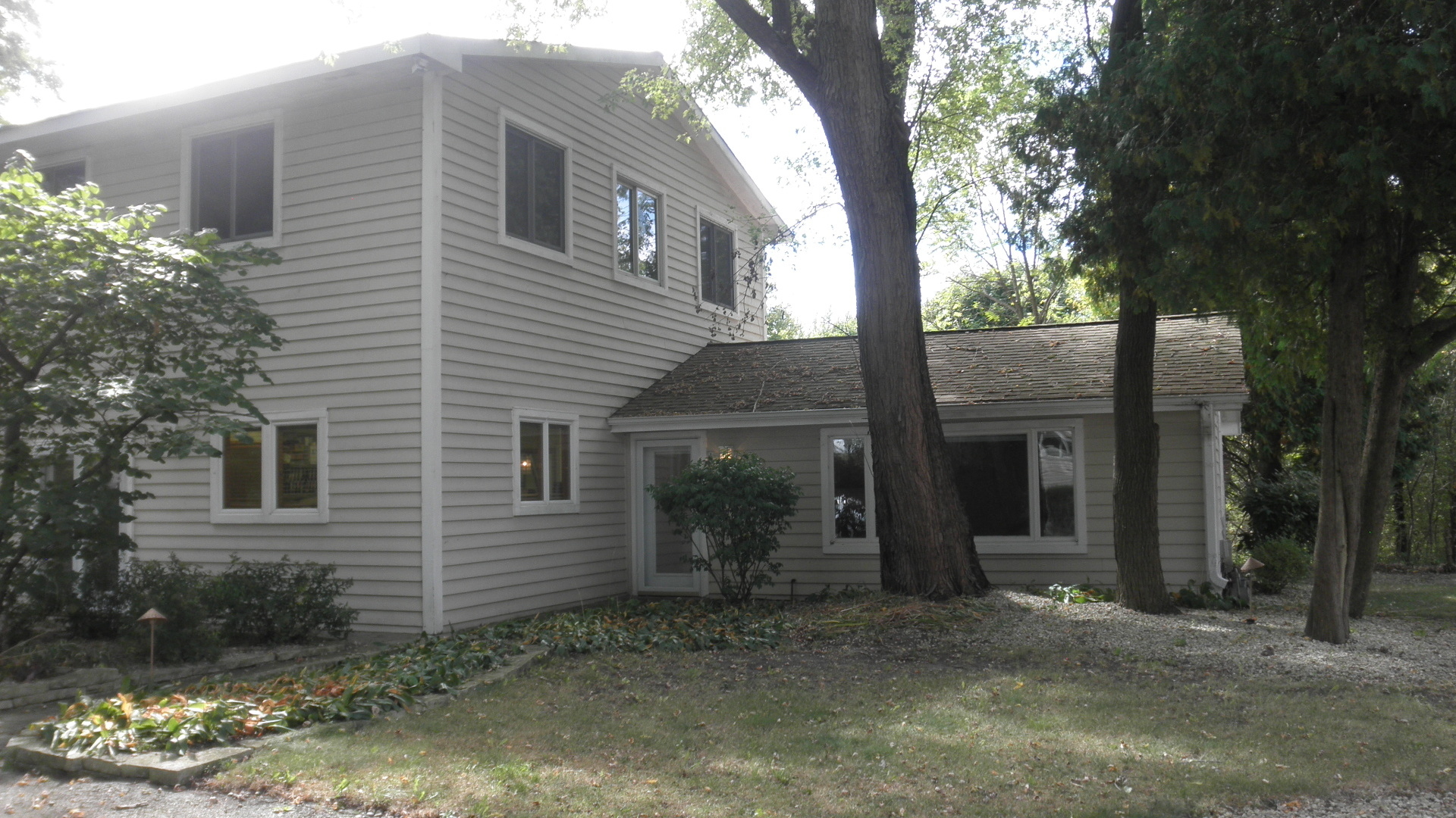 808 Tuxedo Lane Cary, IL 60013 - Photo 25 of 28 a view of a house with a yard and tree s