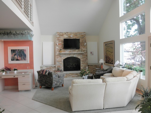 808 Tuxedo Lane Cary, IL 60013 - Photo 6 of 28 a living room with furniture a fireplace and a flat screen tv