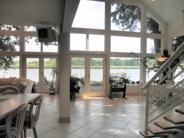 808 Tuxedo Lane Cary, IL 60013 - Photo 9 of 28 a lobby with furniture and large windows