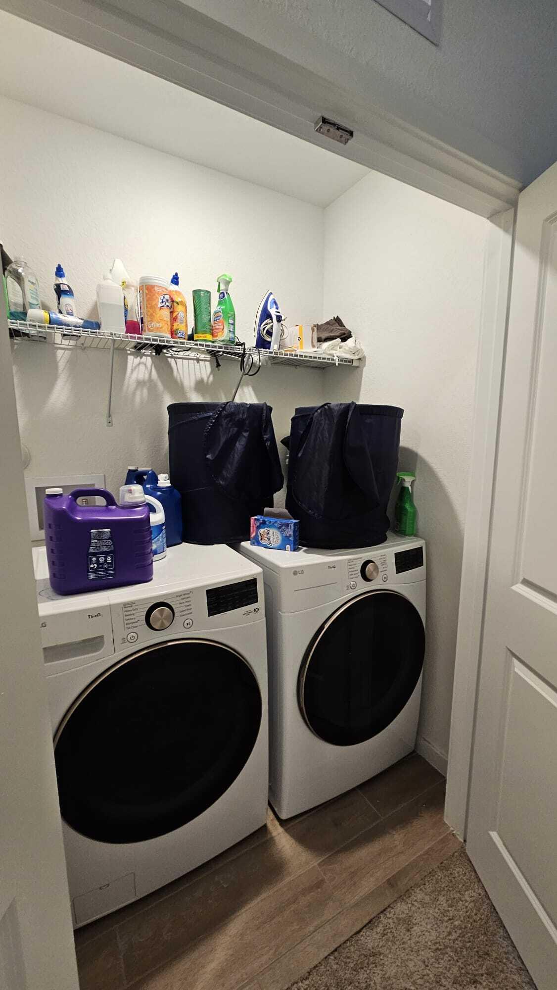 1677 Southeast 8th Street Homestead, FL 33034 - Photo 24 of 52 a view of cabinets and washer dryer