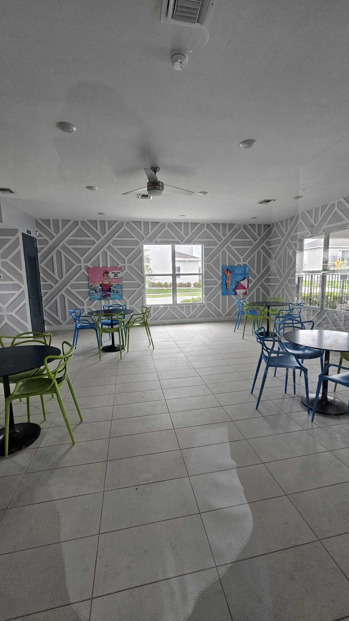 1677 Southeast 8th Street Homestead, FL 33034 - Photo 34 of 52 a living room with furniture and a table