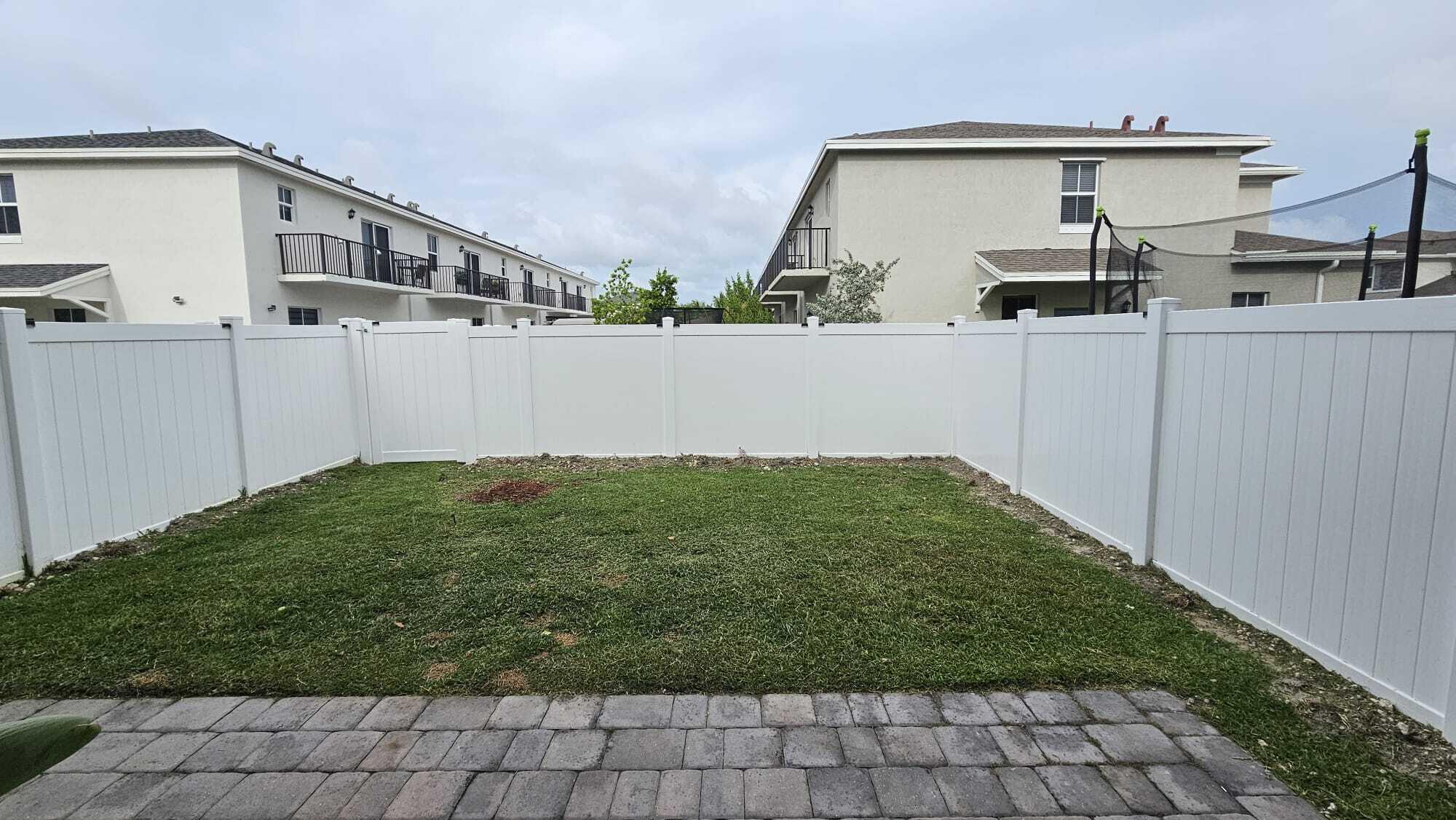 1677 Southeast 8th Street Homestead, FL 33034 - Photo 4 of 52 a front view of a house with garden