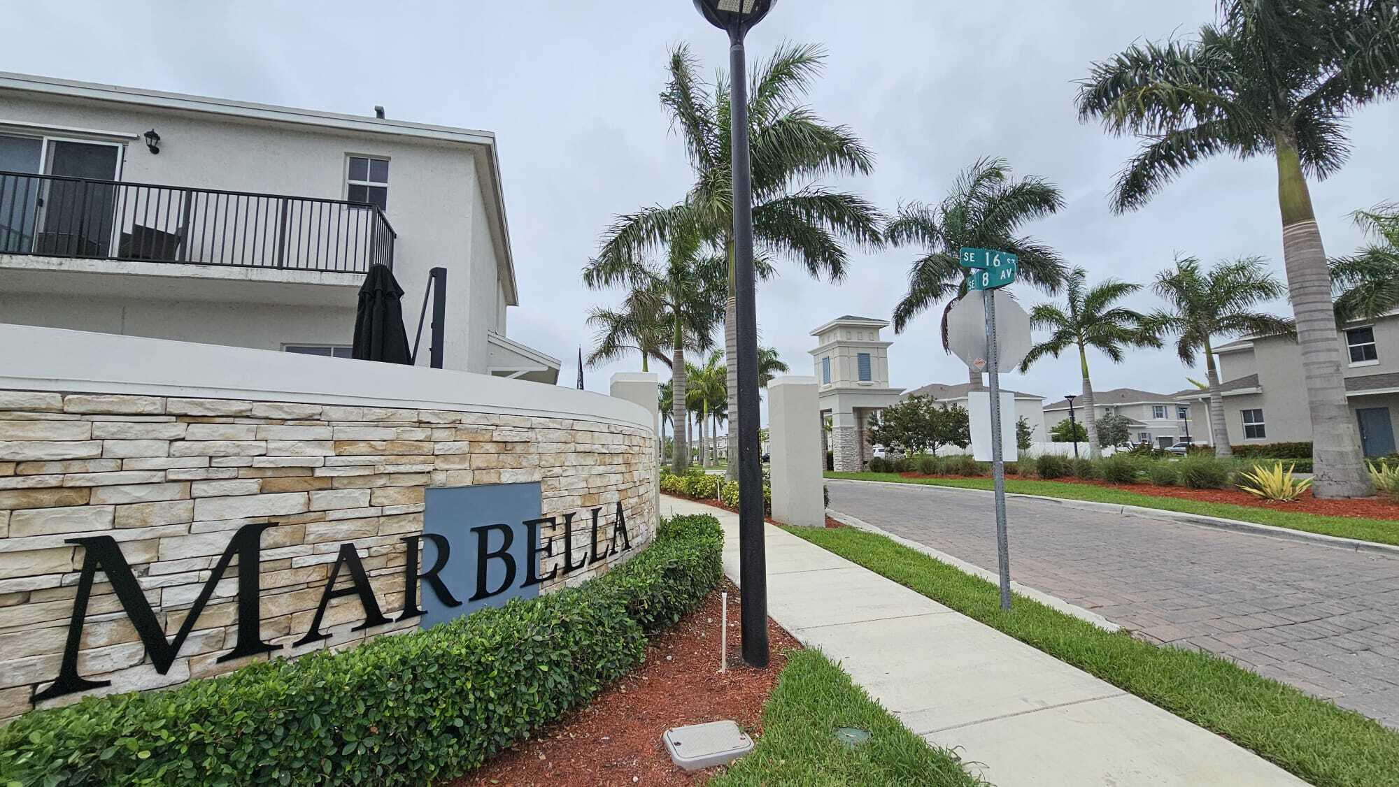 1677 Southeast 8th Street Homestead, FL 33034 - Photo 41 of 52 a view of houses with a street