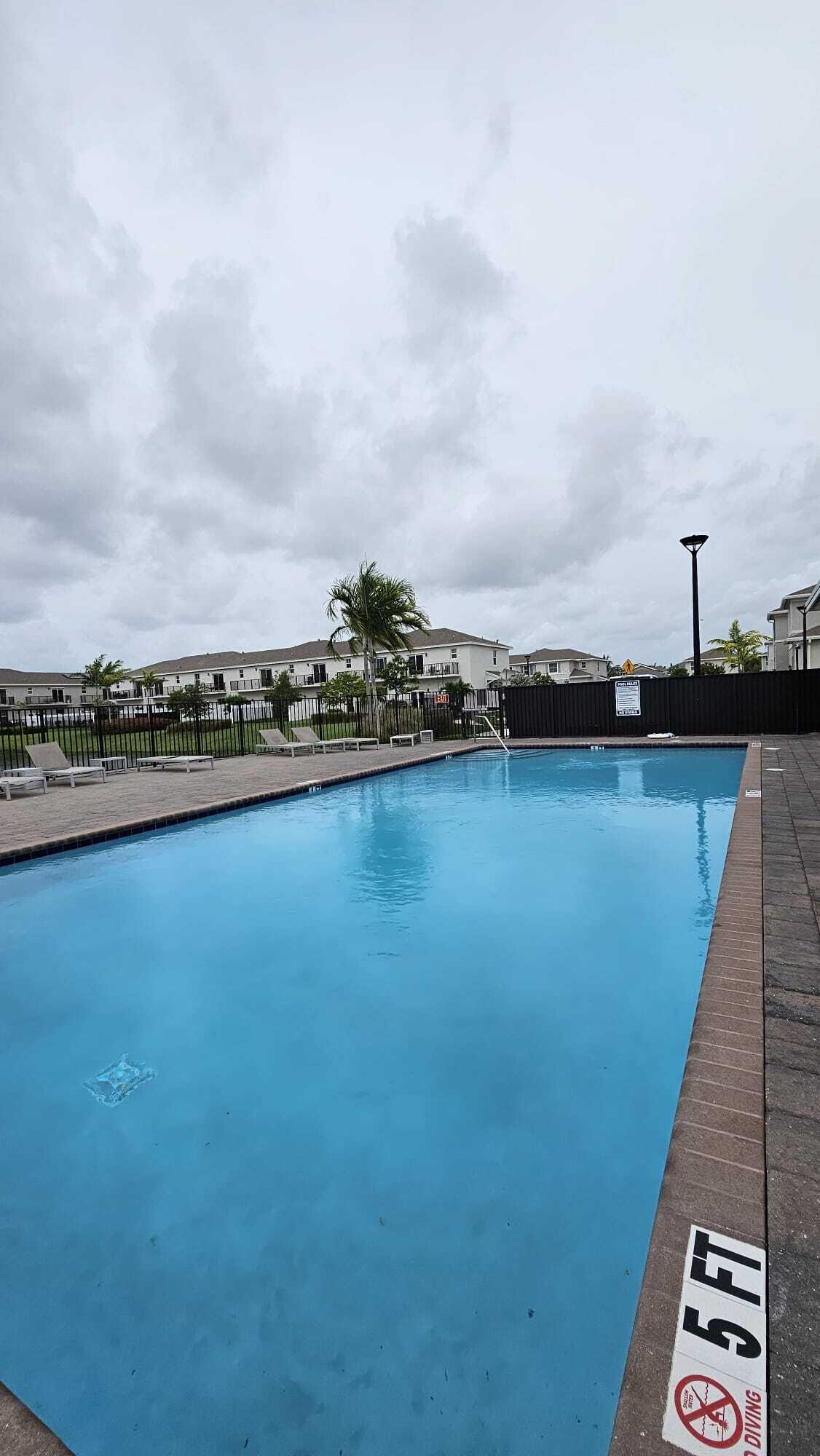 1677 Southeast 8th Street Homestead, FL 33034 - Photo 42 of 52 an aerial view of a city