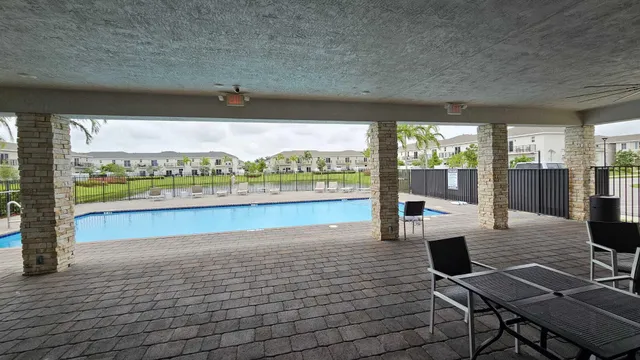 a vase of flowers sitting on a table