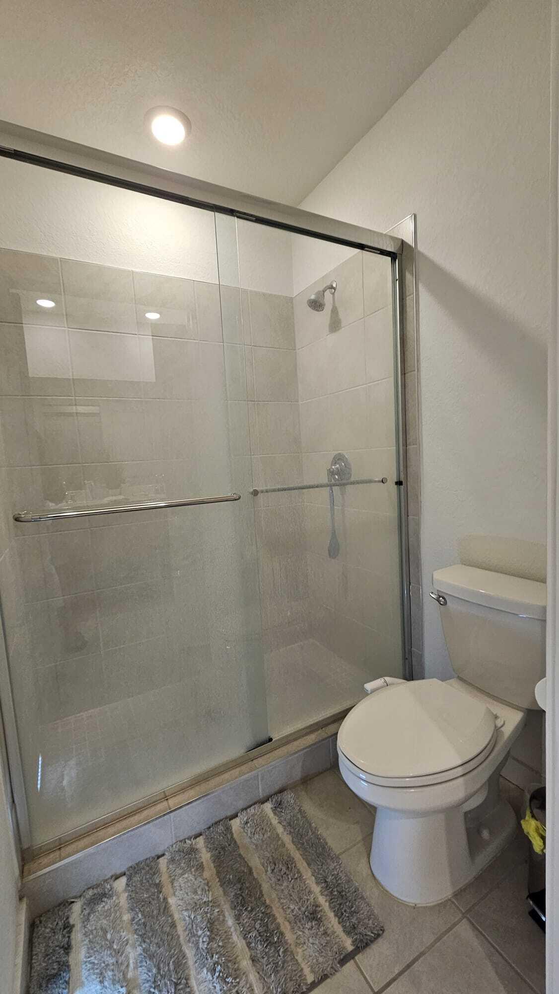 1677 Southeast 8th Street Homestead, FL 33034 - Photo 52 of 52 a white toilet sitting next to a shower