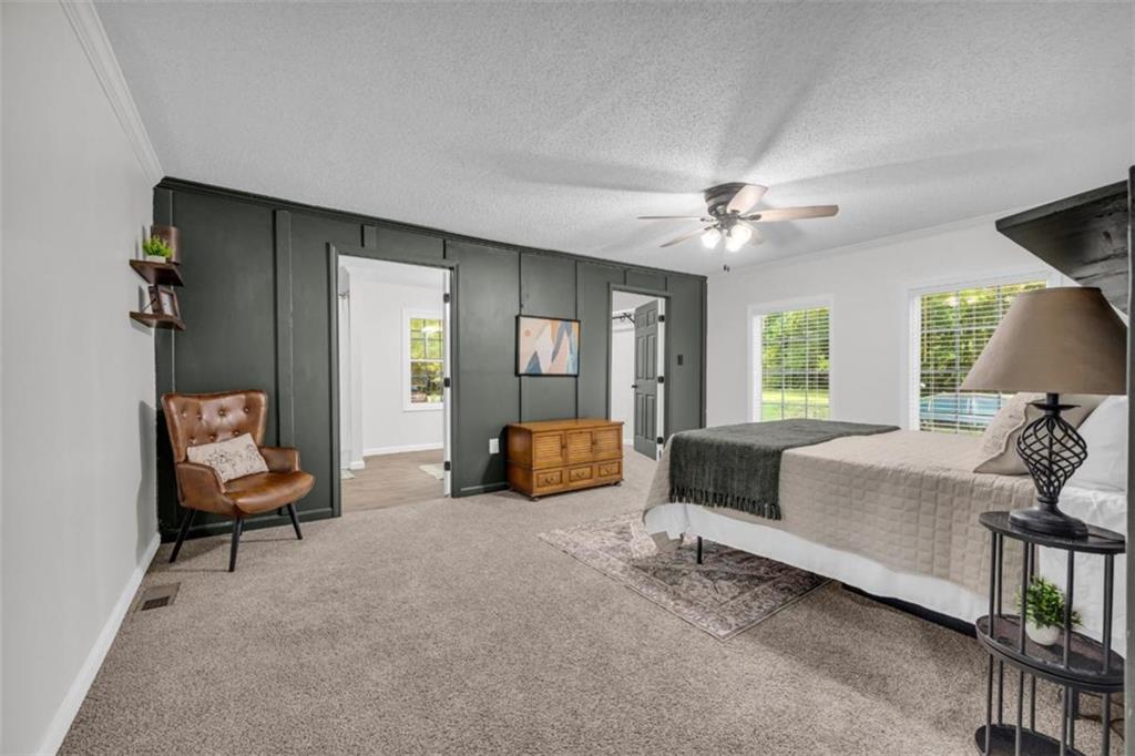 9597 Highway 334 Nicholson, GA 30565 - Photo 20 of 41 a bedroom with furniture and a large window