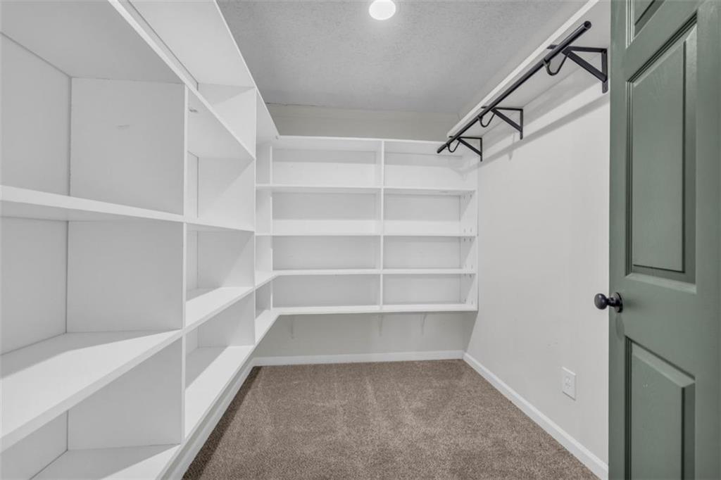 9597 Highway 334 Nicholson, GA 30565 - Photo 23 of 41 a view of a room with shelf