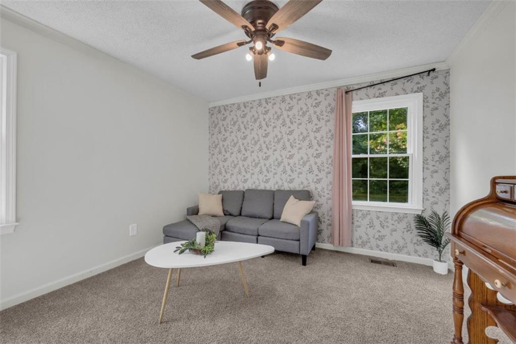9597 Highway 334 Nicholson, GA 30565 - Photo 30 of 41 a living room with furniture and a window