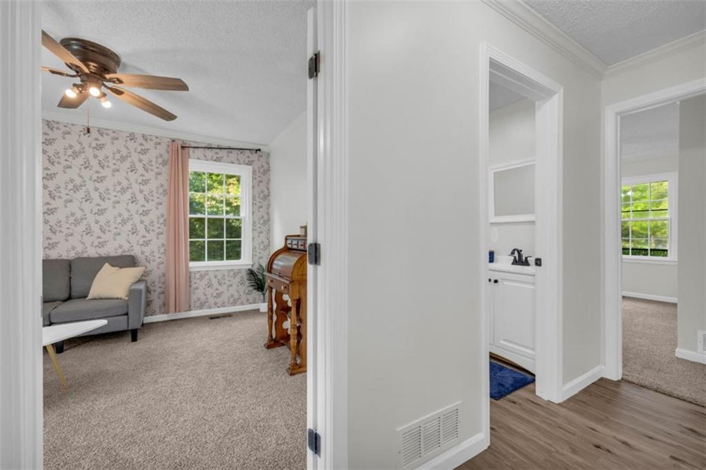 9597 Highway 334 Nicholson, GA 30565 - Photo 31 of 41 a living room with furniture and a window