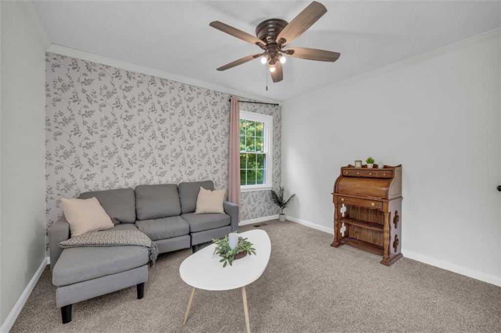 9597 Highway 334 Nicholson, GA 30565 - Photo 32 of 41 a living room with furniture and a window