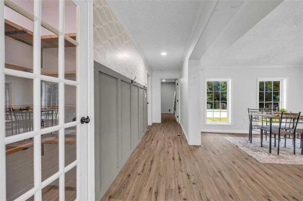 9597 Highway 334 Nicholson, GA 30565 - Photo 10 of 41 a view of a room with furniture and wooden floor