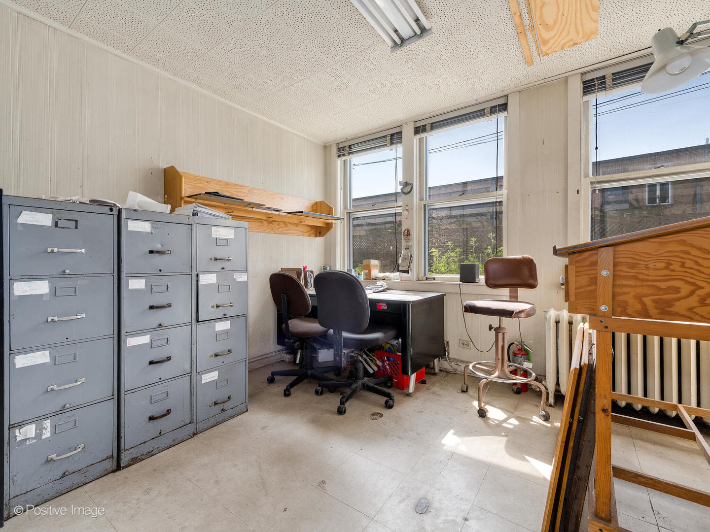933 Green Bay Road Winnetka, IL 60093 - Photo 38 of 46 a view of a workspace with furniture and a window