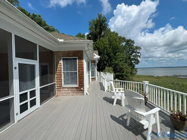 a view of balcony with furniture