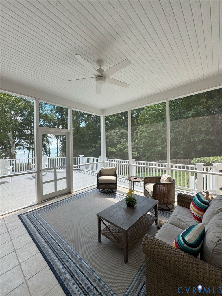 1321 Mt Prospect Road Laneview, VA 22504 - Photo 13 of 49 a living room with furniture and a floor to ceiling window