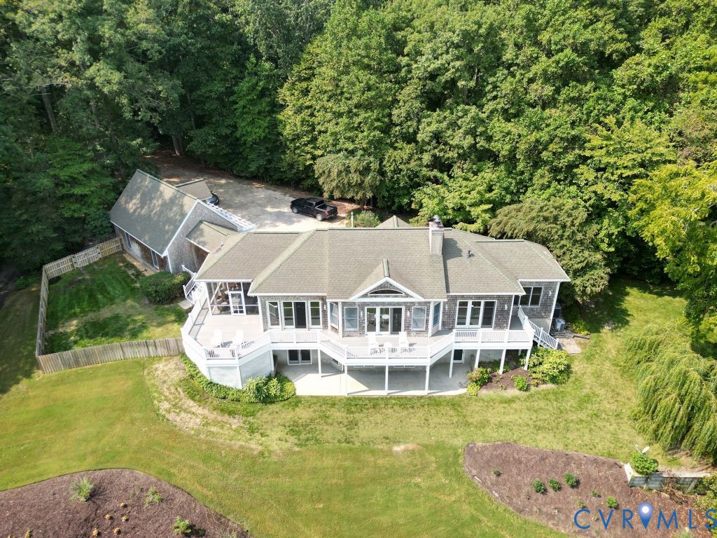 1321 Mt Prospect Road Laneview, VA 22504 - Photo 3 of 49 an aerial view of a house with swimming pool and large trees