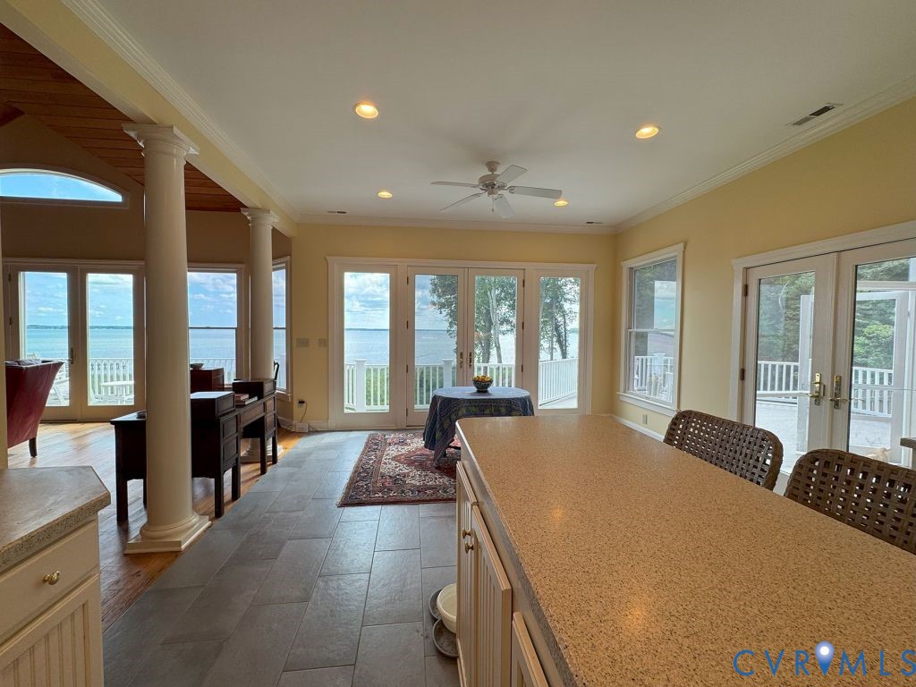 1321 Mt Prospect Road Laneview, VA 22504 - Photo 31 of 49 a large bedroom with a large bed and large windows