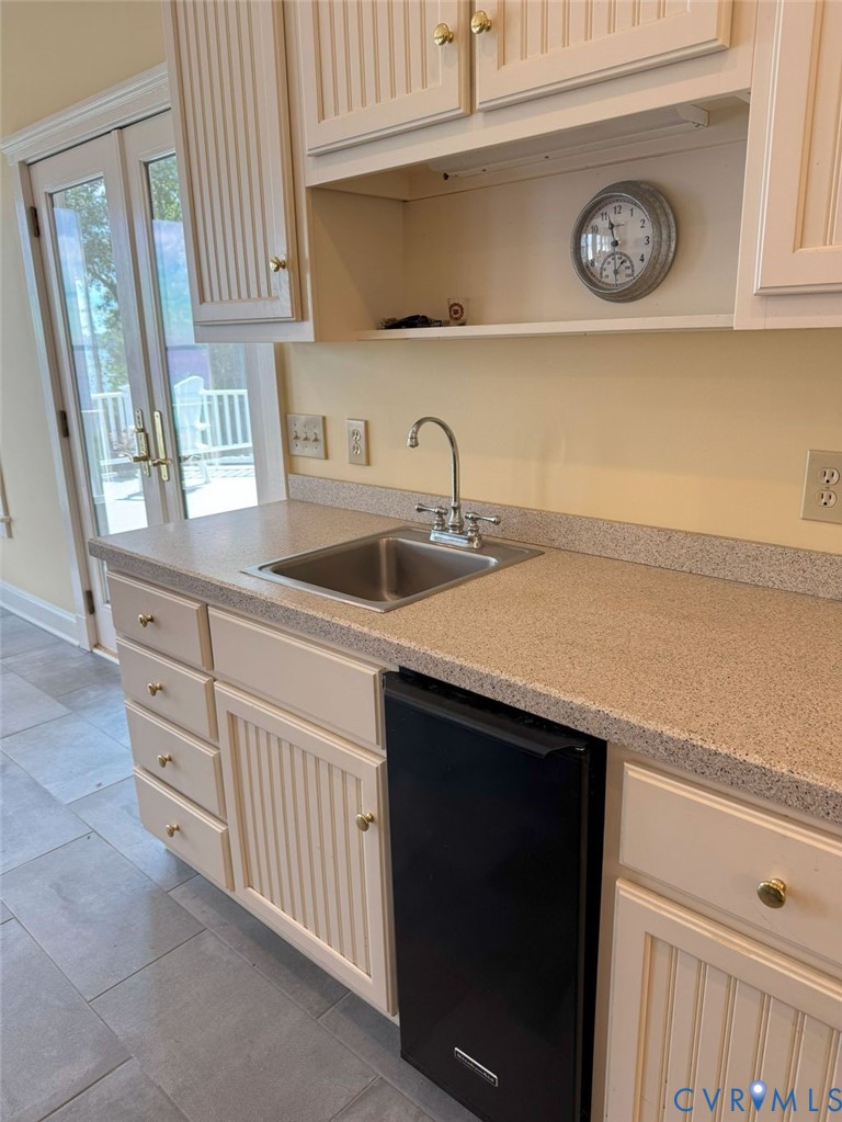 1321 Mt Prospect Road Laneview, VA 22504 - Photo 34 of 49 a kitchen with stainless steel appliances granite countertop a sink and a microwave