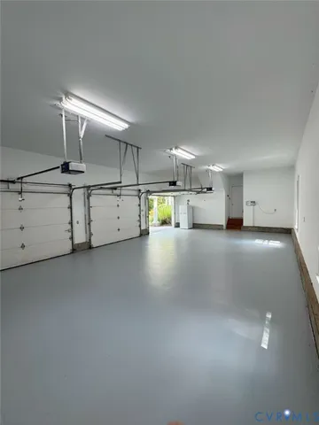 a kitchen with counter and utility room