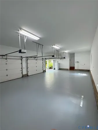 a kitchen with counter and utility room