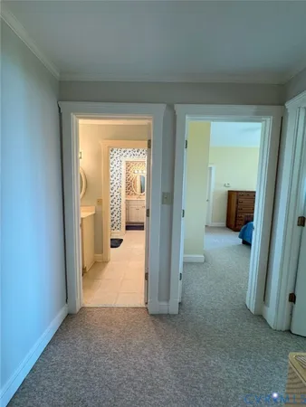 a living room with furniture and windows