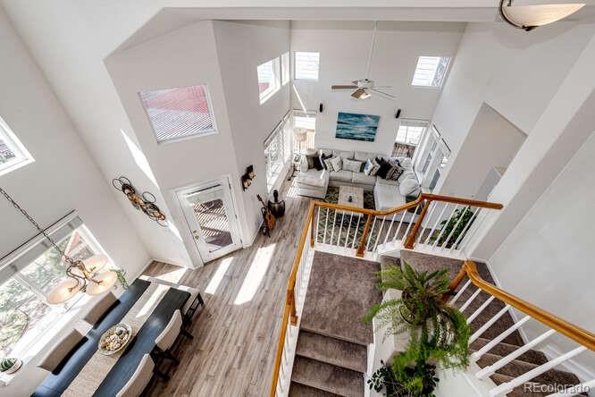 10143 Astorbrook Lane Highlands Ranch, CO 80126 - Photo 15 of 39 a view of living room and dining room