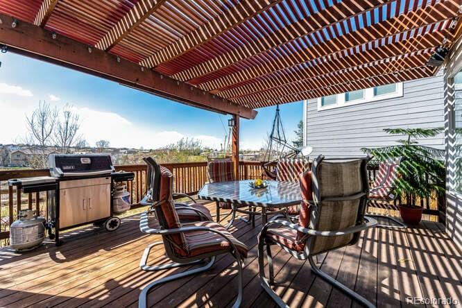 10143 Astorbrook Lane Highlands Ranch, CO 80126 - Photo 28 of 39 a view of a chairs and table in the patio