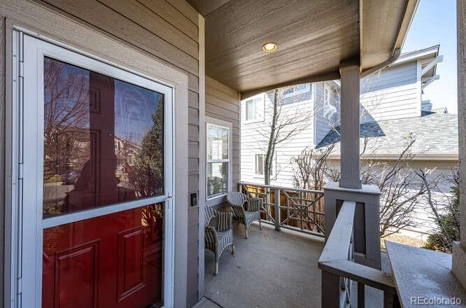 10143 Astorbrook Lane Highlands Ranch, CO 80126 - Photo 3 of 39 a view of front door with dining room
