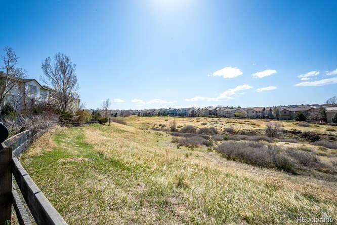 10143 Astorbrook Lane Highlands Ranch, CO 80126 - Photo 33 of 39 a view of a lake view