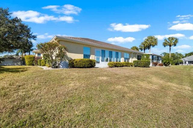 an aerial view of residential house with outdoor space
